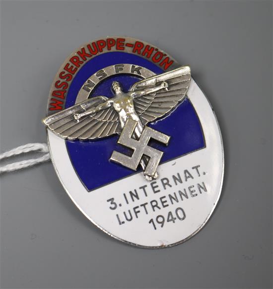 An NSFK enamel badge